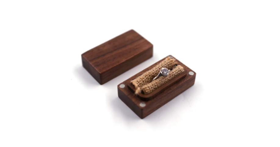 Elegance Unveiled: The Pros and Cons of Wooden vs. Metal Ring Boxes